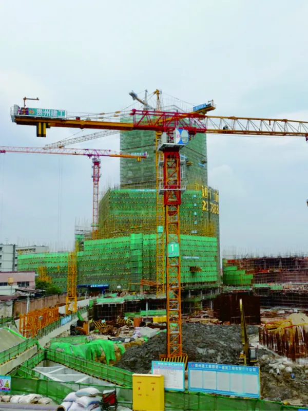 Flat-Top Tower Cranes Used in Commercial Building Construction Project