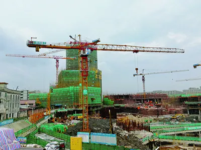 Flat-Top Tower Cranes Used in Commercial Building Construction Project